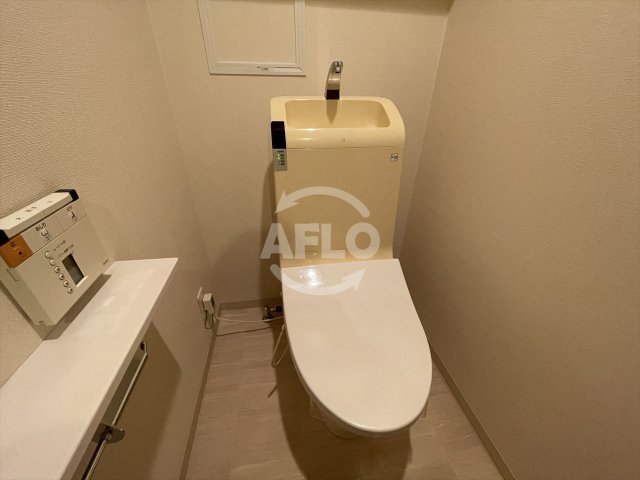 トイレ　淀屋橋アップルタワーレジデンス　温水洗浄便座
