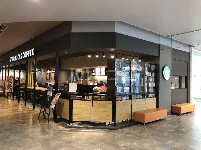 飲食店　スターバックス・コーヒーイオン那覇ショッピングセンター店（飲食店）まで54m