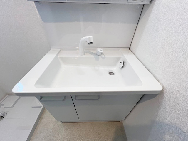 洗面設備　写真は同じタイプの１号棟です