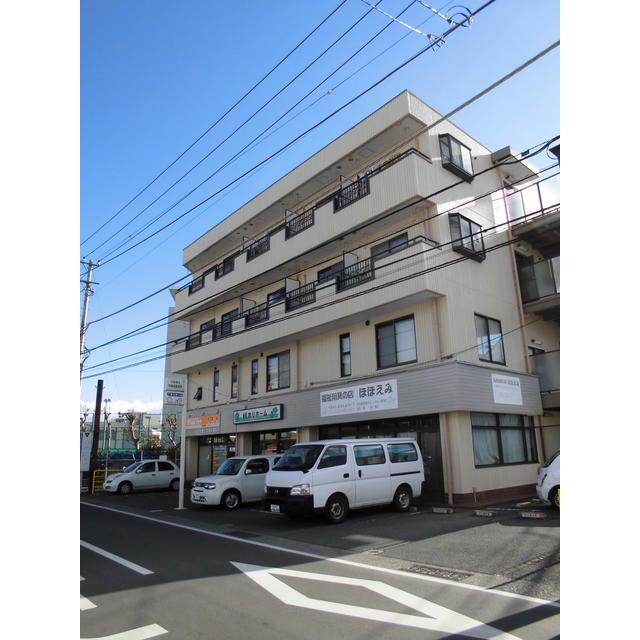 建物外観　４階建重量鉄骨造のマンション４階のお部屋です。