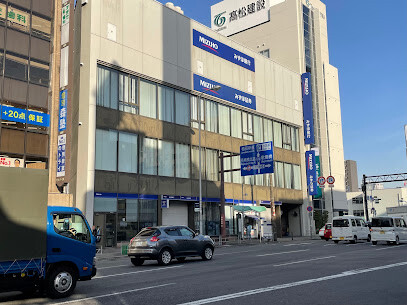 銀行　みずほ銀行 十三支店（銀行）まで350m