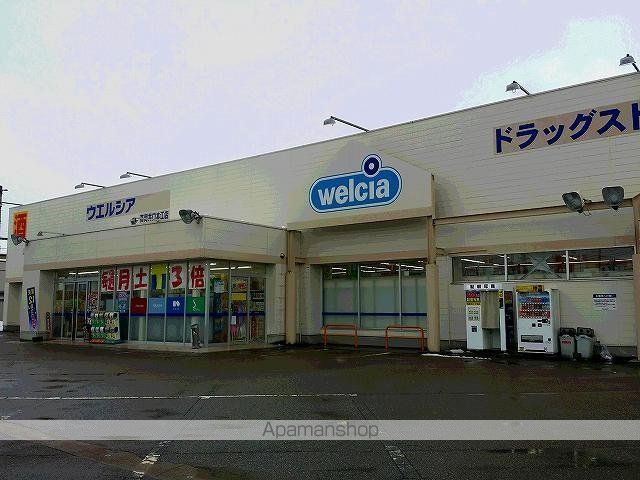 ドラックストア　ウエルシア高岡井口本江店（ドラッグストア）まで400m
