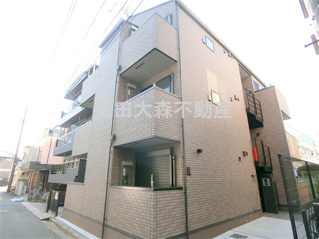建物外観　2021年11月築　木造地上3階建て総戸数9戸最大1ギガのイ
