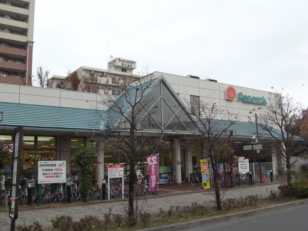 スーパー　ピーコックストア花小金井店（スーパー）まで711m