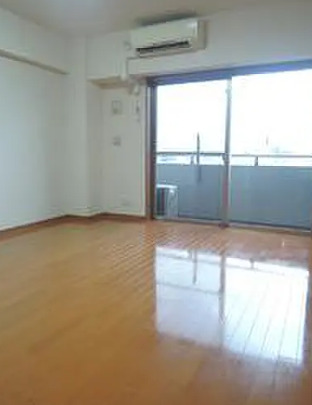 居室・リビング　別部屋の写真を使用しております。