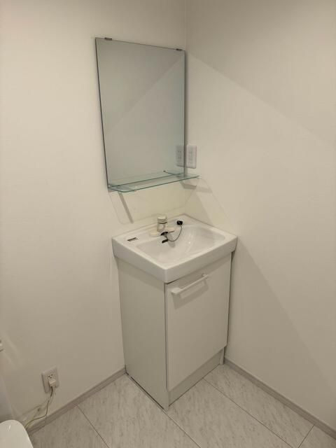 洗面設備　同施工事例参照写真