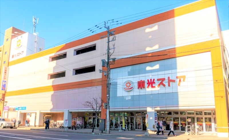 スーパー　東光ストア麻生店（スーパー）まで671m