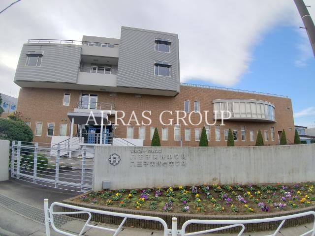 中学校　実践中高等学校（中学校）まで730m
