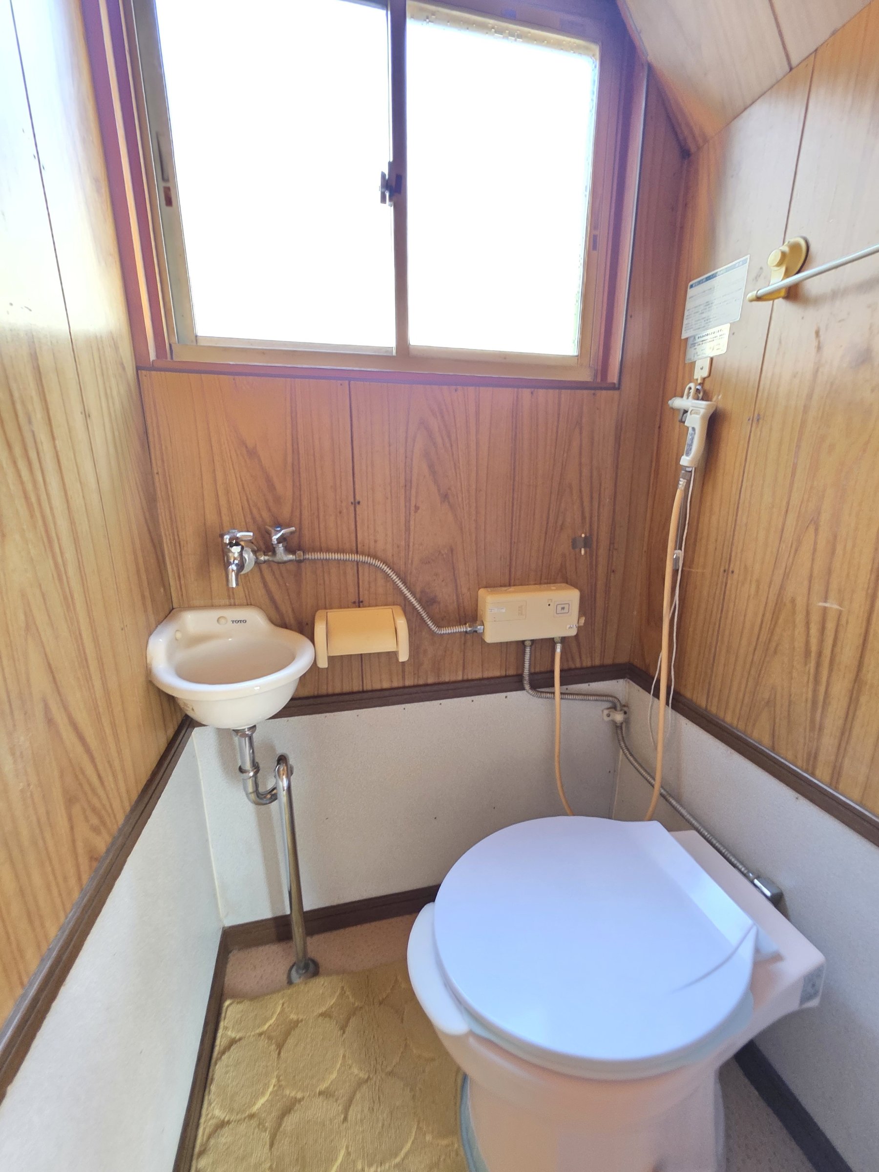 桜ヶ丘戸建のトイレ写真