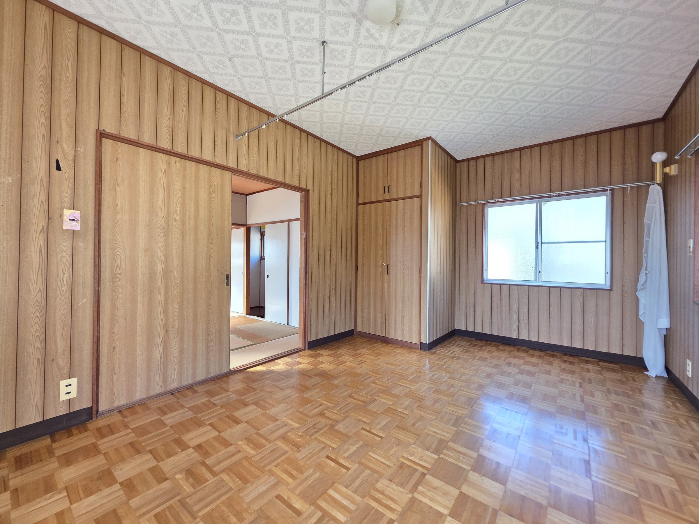 桜ヶ丘戸建の居間写真