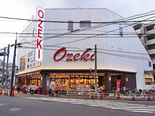 スーパー　スーパーオオゼキ経堂駅前店（スーパー）まで440m