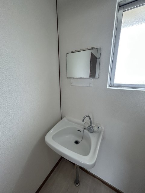 洗面設備　※写真は２０３号室です