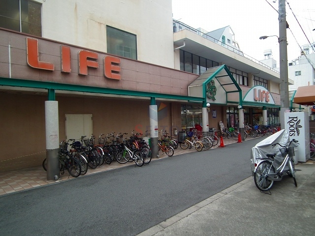 スーパー　ライフ塚本店（スーパー）まで596m