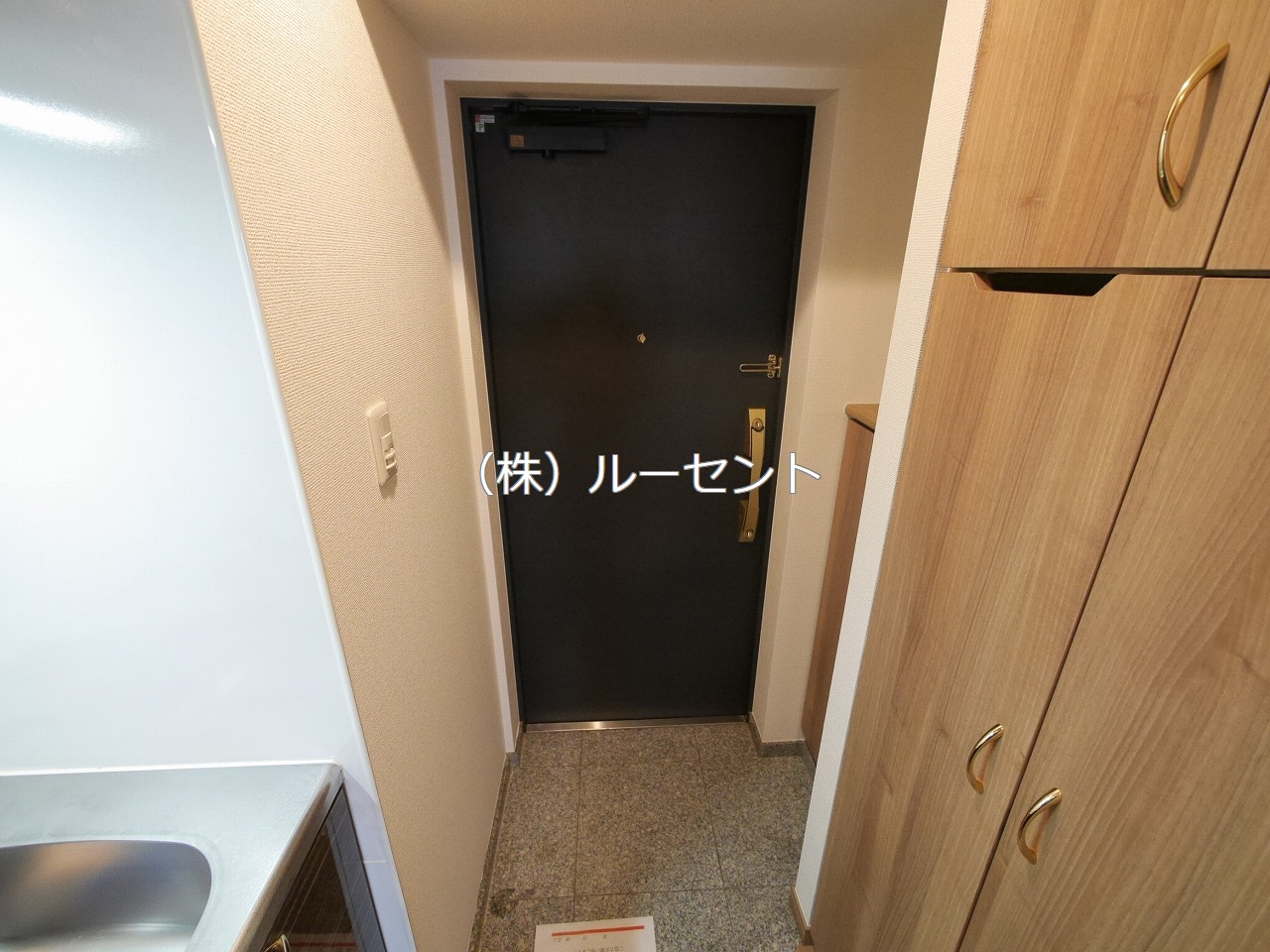 都営三田線 西巣鴨駅 徒歩10分 7階建 築18年の玄関写真