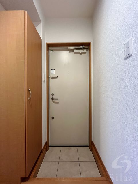 地下鉄長堀鶴見緑地線 蒲生四丁目駅 徒歩5分 3階建 築18年の玄関写真