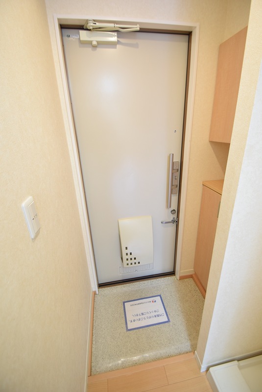レジデンシァル旭IIの玄関写真