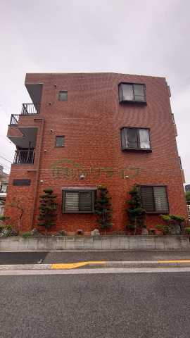 建物外観　タイル張りのマンションです。