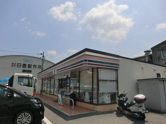 コンビニ　セブン-イレブン向日南金村店（コンビニ）まで1247m
