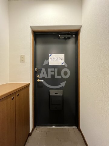 玄関　ノルデンハイム東三国III　A棟　玄関