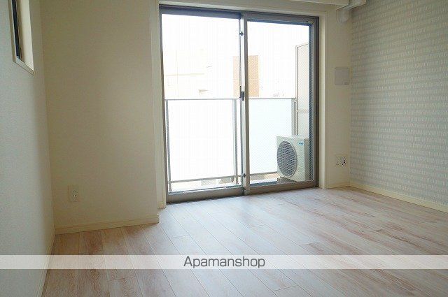 SHOKEN Residence横浜桜木町の居間写真