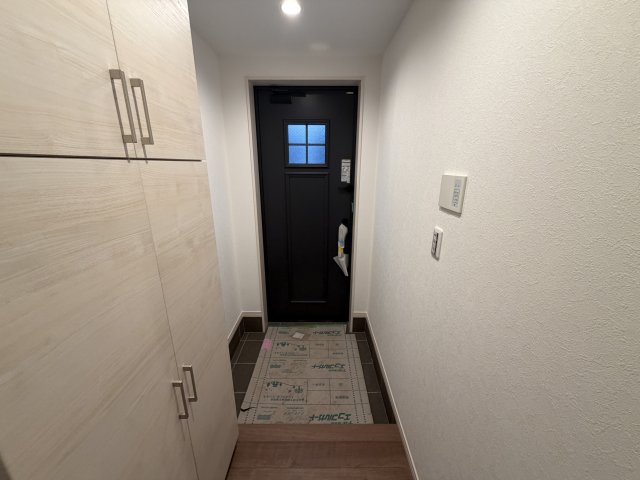 QualitiA上十条戸建の玄関写真