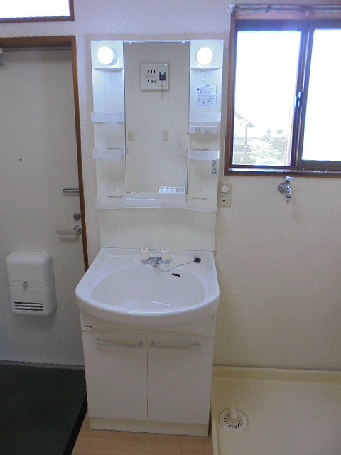 洗面設備　写真は201号室です