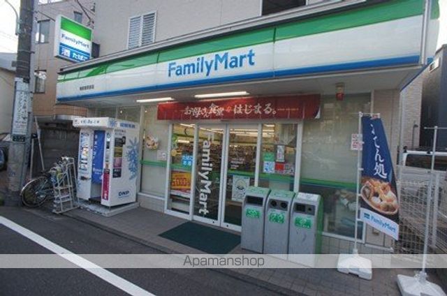 コンビニ　ファミリーマート（コンビニ）まで409m