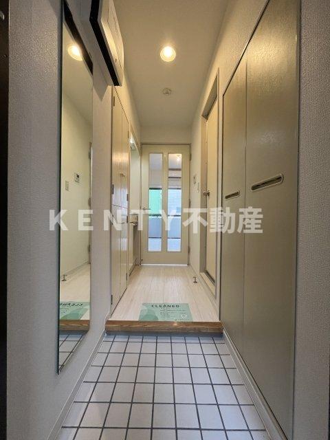 エミネンスコート多摩堤通りの玄関写真