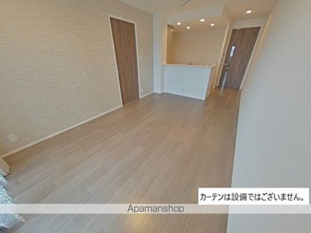 アルファステイツ熊本駅東の居間写真
