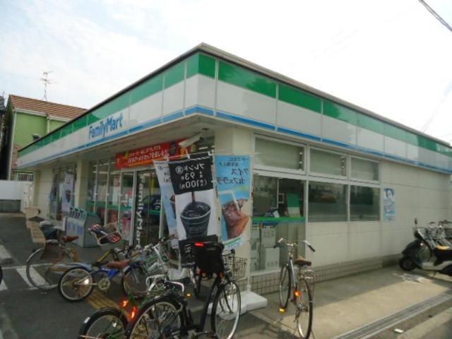 コンビニ　ファミリーマート京屋長曽根店（コンビニ）まで584m