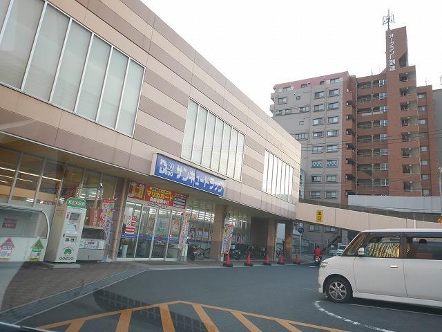 ドラックストア　株式会社サンキュードラッグ／到津店（ドラッグストア）まで308m