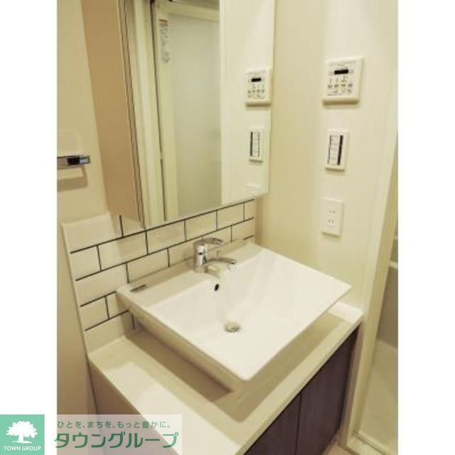 洗面設備　※写真は同タイプ住戸です。