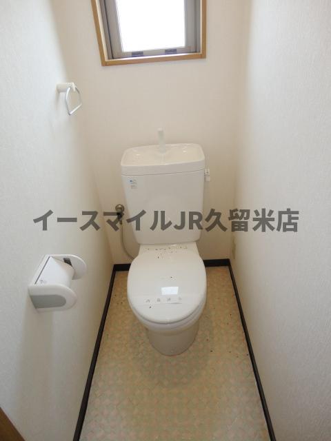 トイレ　落ち着いた色調のトイレです