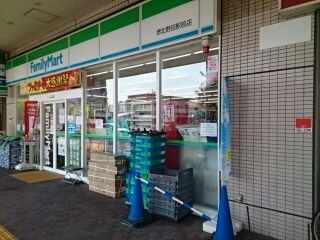 コンビニ　ファミリーマート様（コンビニ）まで1050m
