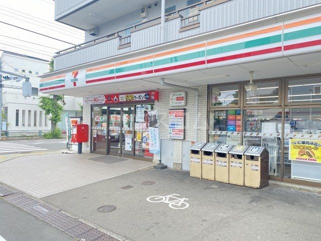コンビニ　セブン-イレブン 日野旭ヶ丘店（コンビニ）まで915m