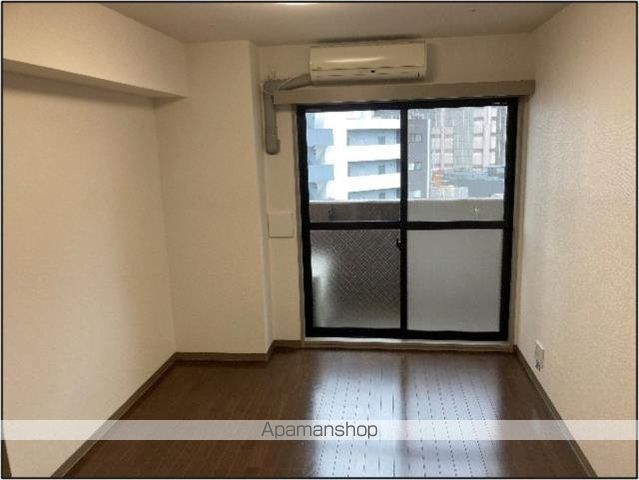 フェニックス田町の居間写真