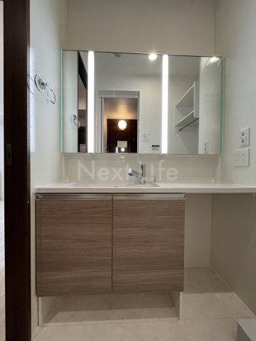 洗面設備　※同施工会社の参考写真です。