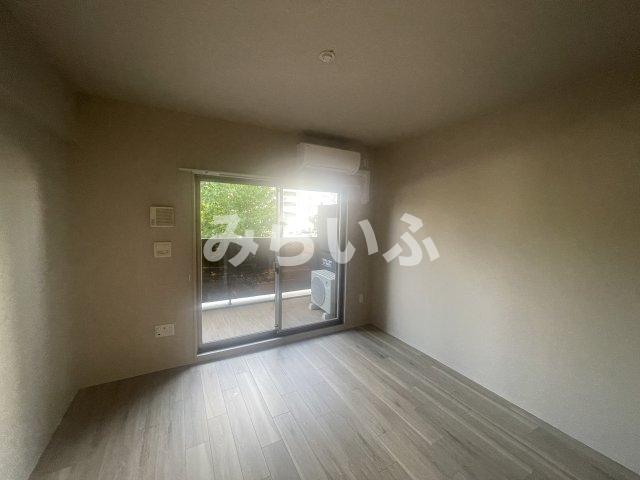 居室・リビング　※205号室の写真です。