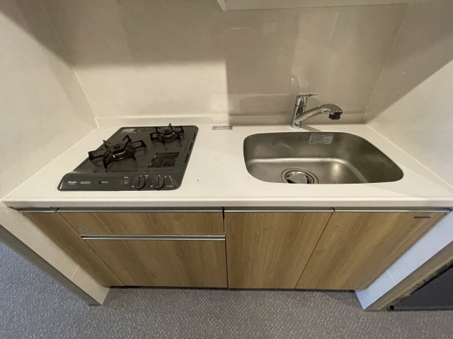 キッチン　同マンション反転タイプの部屋写真