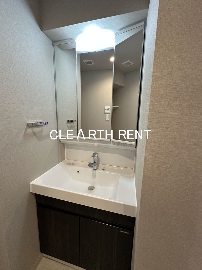 洗面設備　人工大理石のカウンター一体型の洗面ボウル