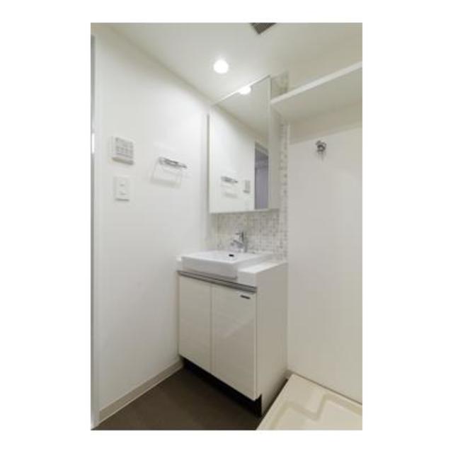 洗面設備　写真は同タイプ住戸です。