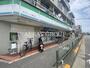 コンビニ　ファミリーマート まるいし八幡山店（コンビニ）まで63m