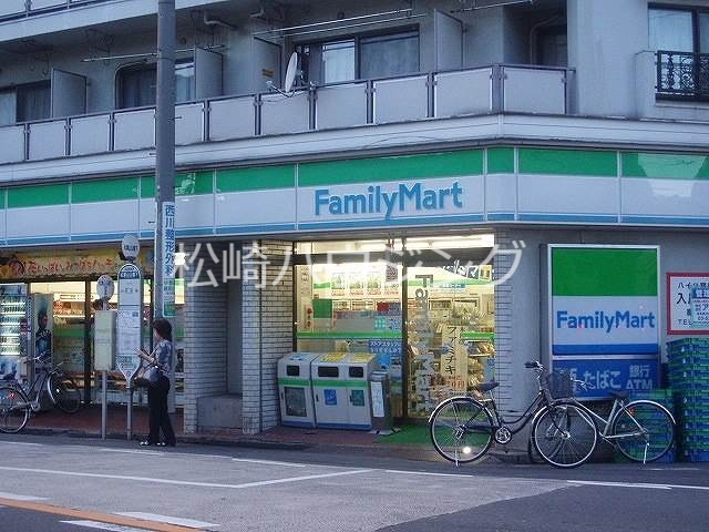 コンビニ　ファミリーマート新中野店（コンビニ）まで242m