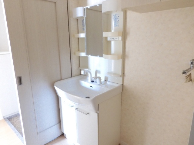 洗面設備　※６０４号室の写真です