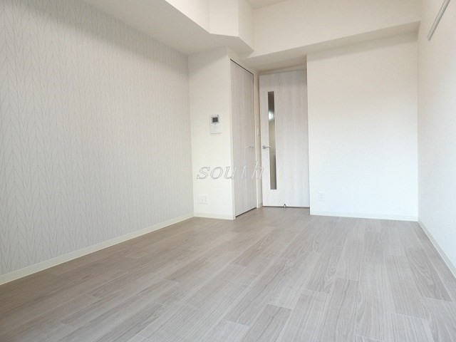 プレサンス上町台筆ヶ崎NORTHの居間写真