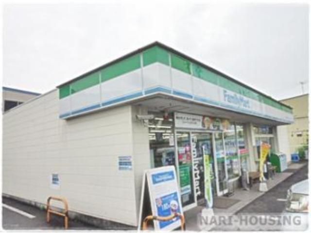 コンビニ　ファミリーマート武蔵村山神明店（コンビニ）まで340m