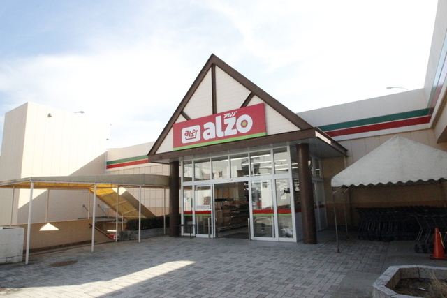 スーパー　万惣高取店（スーパー）まで383m
