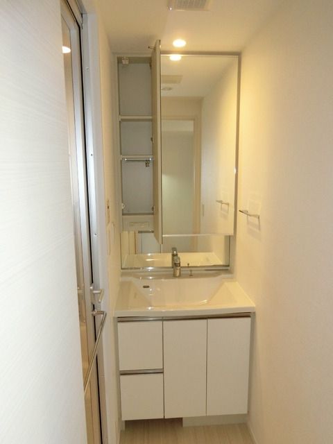 洗面設備　※同タイプ住戸参考写真　現況優先