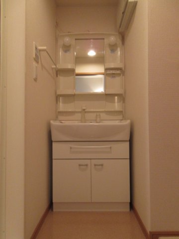 洗面設備　写真は別の部屋のものです。