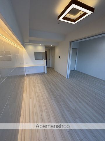 地下鉄長堀鶴見緑地線 今福鶴見駅 徒歩12分 12階建 築1年の居間写真